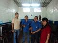 Equipo de COEX junto a la encargada del Centro Escolar "Caserío Las Chinitas"en el centro de cómputo del mismo.